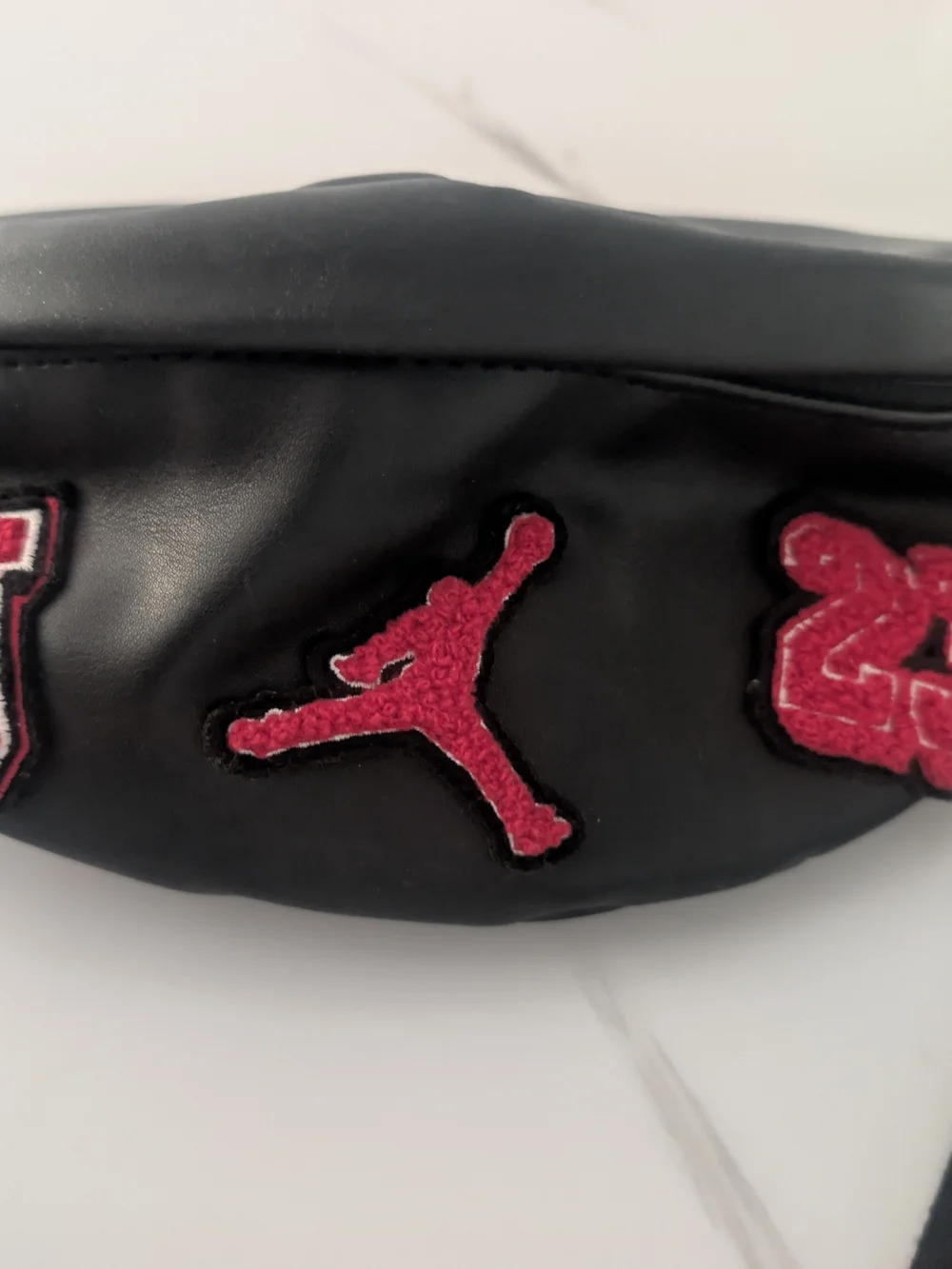 Nike Black Sling Bag with Red Logo Patch
